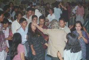 People receive a touch from God as Julie and team pray