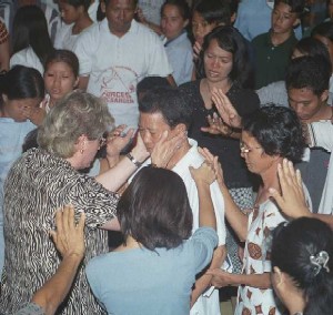 God's power very present to heal as Julie prays for people
