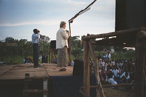 Julie preaching with Interpreter at Crusade