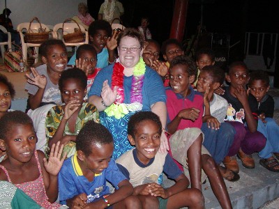 Emma McPhail in a sea of children