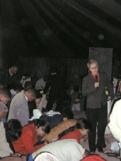 Response at the tent meeting