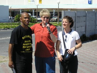 Julie, Jenni, & Jurie, a young evangelist, at the street outreach